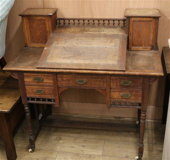 A French oak writing desk W.107cm